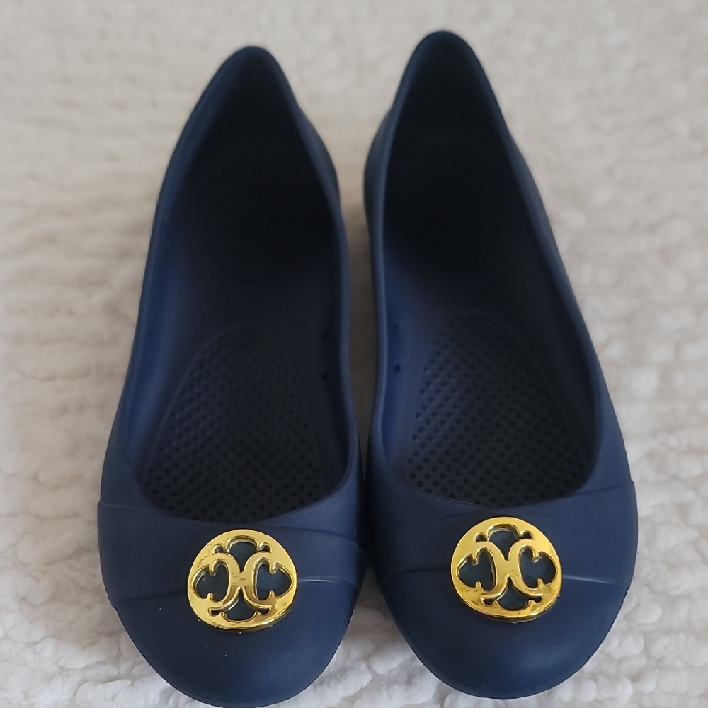 Crocs Chic Navy Flats with Gold Emblem sz 8